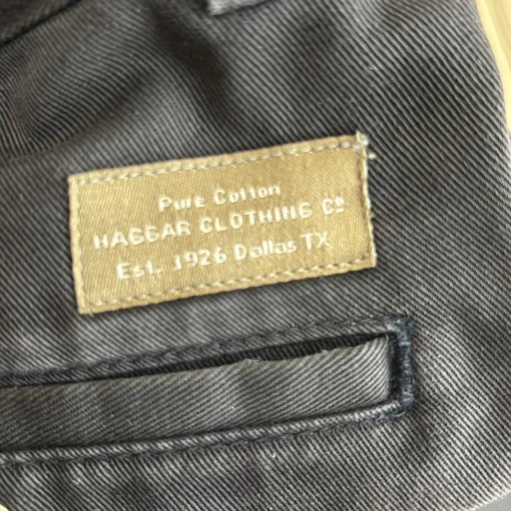 Haggar Mens Black Khaki Pants. Excellent Condition. 38 waist and 33 inch inseam.